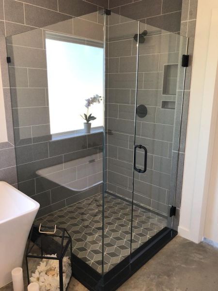 Clear glass shower enclosure by Weatherford Glass