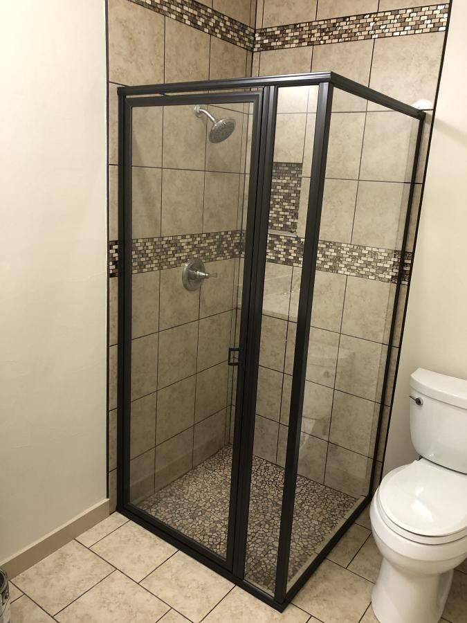 Framed glass shower by Weatherford Glass